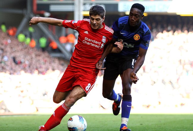 LIVERPOOL, ENGLAND - OCTOBER 15:  Steven Gerrard of Liverpool competes with Danny Welbeck of Manchester United during the Barclays Premier League match between Liverpool and Manchester United at Anfield on October 15, 2011 in Liverpool, England.  (Photo by Clive Brunskill/Getty Images)