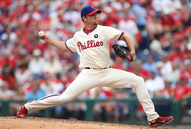 PHILADELPHIA - JULY 25: Relief pitcher Brad Lidge #54 of the Philadelphia Phillies throws a pitch during a game against the San Diego Padres at Citizens Bank Park on July 25, 2011 in Philadelphia, Pennsylvania. The Padres won 5-4. (Photo by Hunter Martin/Getty Images)