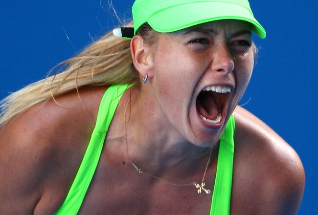 MELBOURNE, AUSTRALIA - JANUARY 26:  Maria Sharapova of Russia celebrates match point in her semifinal match against Petra Kvitova of the Czech Republic during day eleven of the 2012 Australian Open at Melbourne Park on January 26, 2012 in Melbourne, Australia.  (Photo by Mark Dadswell/Getty Images)