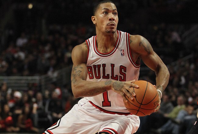 CHICAGO, IL - JANUARY 09:  Derrick Rose #1 of the Chicago Bulls drives the lane against the Detroit Pistons at the United Center on January 9, 2012 in Chicago, Illinois. The Bulls defeated the Pistons 92-68. NOTE TO USER: User expressly acknowledges and agrees that, by downloading and or using this photograph, User is consenting to the terms and conditions of the Getty Images License Agreement.  (Photo by Jonathan Daniel/Getty Images)