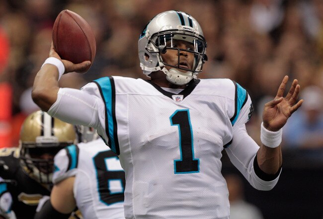 NEW ORLEANS, LA - JANUARY 01:   Cam Newton #1 of the Carolina Panthers looks to throw a pass during the game against the New Orleans Saints at the Mercedes-Benz Superdome on January 1, 2012 in New Orleans, Louisiana.  The Saints defeated the Panthers 45-17.  (Photo by Chris Graythen/Getty Images)