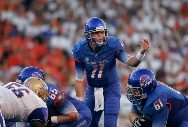 BOISE, ID - SEPTEMBER 24: Kellen Moore #11 of the Boise State Broncos calls a play against the Tulsa Golden Hurricane at Bronco Stadium on September 24, 2011 in Boise, Idaho.  (Photo by Otto Kitsinger III/Getty Images)