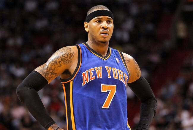 MIAMI, FL - FEBRUARY 27:  Carmelo Anthony #7 of the New York Knicks stands on the court during a game against the Miami Heat at American Airlines Arena on February 27, 2011 in Miami, Florida. NOTE TO USER: User expressly acknowledges and agrees that, by downloading and/or using this Photograph, User is consenting to the terms and conditions of the Getty Images License Agreement.  (Photo by Mike Ehrmann/Getty Images)