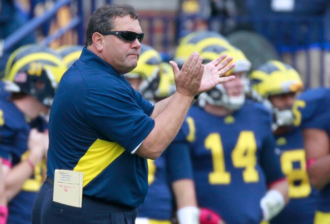 ANN ARBOR, MI - OCTOBER 29: Head coach Brady Hoke cheers on his team from the sideline while playing the Purdue Boilermakers at Michigan Stadium on October 29, 2011 in Ann Arbor, Michigan. Michigan won the game 36-14. (Photo by Gregory Shamus/Getty Images)