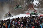 ASPEN, CO - JANUARY 30:  Spectators pack together next to the course as competitors criss cross the course during an elimination round in the Snowmobile SnoCross during Winter X Games 15 at Buttermilk Mountain on January 30, 2011 in Aspen, Colorado.  (Photo by Doug Pensinger/Getty Images)