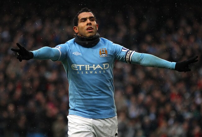 MANCHESTER, ENGLAND - FEBRUARY 05:  Carlos Tevez of Manchester City celebrates after scoring his third goal during the Barclays Premier League match between Manchester City and West Bromwich Albion at the City of Manchester Stadium on February 5, 2011 in Manchester, England.  (Photo by Alex Livesey/Getty Images)