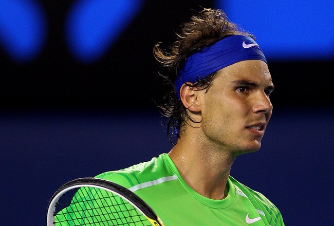 MELBOURNE, AUSTRALIA - JANUARY 26:  Rafael Nadal of Spain celebrates winning a point in his semifinal match against Roger Federer of Switzerland during day eleven of the 2012 Australian Open at Melbourne Park on January 26, 2012 in Melbourne, Australia.  (Photo by Cameron Spencer/Getty Images)