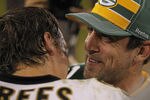 GREEN BAY, WI - SEPTEMBER 08: Aaron Rodgers #12 of the Green Bay Packers talks with Drew Brees #9 of the New Orleans Saints after the NFL opening season game at Lambeau Field on September 8, 2011 in Green Bay, Wisconsin. The Packers defeated the Saints 42-34. (Photo by Jonathan Daniel/Getty Images)