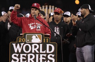 ST. LOUIS, MO - OCTOBER 30: Manager Tony La Russa (L-R) speaks to fans as Octavio Dotel and Albert Pujols of the St. Louis Cardinals look on during a ceremony celebrating the team's 11th World Series championship October 30, 2011 at Busch Stadium in St. Louis, Missouri. (Photo by Whitney Curtis/Getty Images)