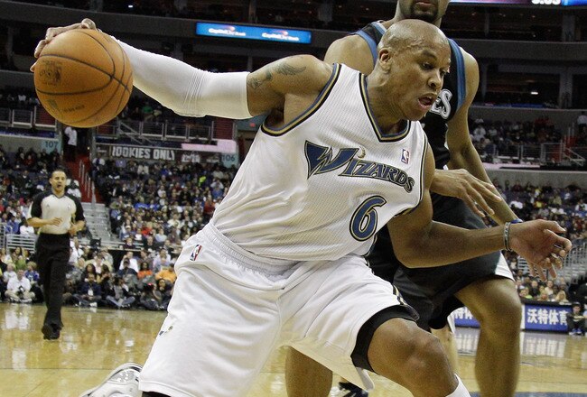 WASHINGTON, DC - MARCH 05:  Maurice Evans #6 of the Washington Wizards is guarded by Lazar Hayward #32 of the Minnesota Timberwolves at the Verizon Center on March 5, 2011 in Washington, DC. NOTE TO USER: User expressly acknowledges and agrees that, by downloading and/or using this Photograph, User is consenting to the terms and conditions of the Getty Images License Agreement.  (Photo by Rob Carr/Getty Images)