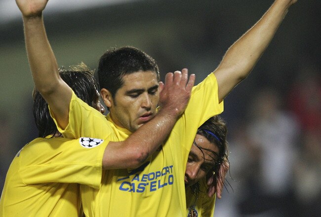 VILLARREAL, SPAIN - OCTOBER 18: Riquelme of Villarreal celebrates with teammates after scoring a penalty during a UEFA Champions League, group D, match between Villarreal C.F. and S.L Benfica on October 18, 2005 at the Madrigal stadium in Villarreal, Spain.  (Photo by Denis Doyle/Getty Images)