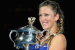 MELBOURNE, AUSTRALIA - JANUARY 28:  Victoria Azarenka of Belarus poses with the Daphne Akhurst Memorial Cup after winning her women's final match against Maria Sharapova of Russia, and being named world number one, during day thirteen of the 2012 Australian Open at Melbourne Park on January 28, 2012 in Melbourne, Australia.  (Photo by Lucas Dawson/Getty Images)
