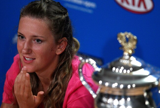 MELBOURNE, AUSTRALIA - JANUARY 28:  Victoria Azarenka of Belarus speaks at her winner's press conference with the Daphne Akhurst Memorial Cup after winning her women's final match against Maria Sharapova of Russia, and being named world number one, during day thirteen of the 2012 Australian Open at Melbourne Park on January 28, 2012 in Melbourne, Australia.  (Photo by Ryan Pierse/Getty Images)