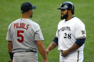 MILWAUKEE, WI - AUGUST 03: Prince Fielder #28 of the Milwaukee Brewers has words with Albert Pujols #5 of the St. Louis Cardinals at first base at Miller Park on August 3, 2011 in Milwaukee, Wisconsin. (Photo by Scott Boehm/Getty Images)
