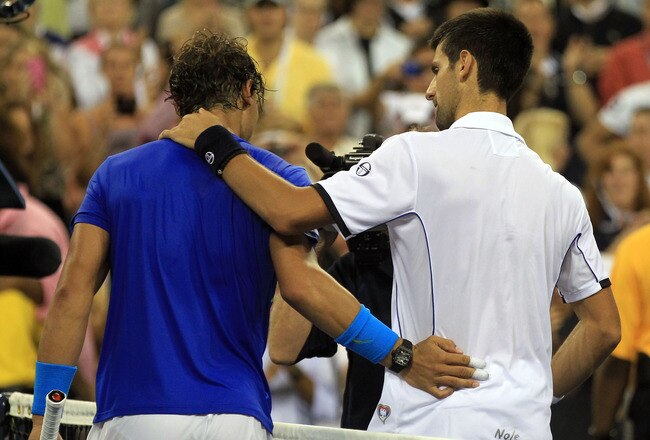 NEW YORK, NY - SEPTEMBER 12:   Rafael Nadal of Spain congratulates  Novak Djokovic of Serbia after Djokovic won the Men's Final on Day Fifteen of the 2011 US Open at the USTA Billie Jean King National Tennis Center on September 12, 2011 in the Flushing neighborhood of the Queens borough of New York City.  (Photo by Matthew Stockman/Getty Images)