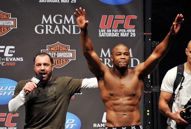 LAS VEGAS - MAY 28:  UFC fighter Rashad Evans (R) reacts to the crowd while speaking to UFC announcer Joe Rogan (L) about his fight against UFC fighter Quinton 'Rampage' Jackson at UFC 114: Rampage versus Rashad at the Mandalay Bay Hotel on May 28, 2010 in Las Vegas, Nevada.  (Photo by Jon Kopaloff/Getty Images)