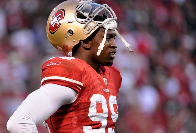 SAN FRANCISCO, CA - JANUARY 14:  Aldon Smith #99 of the San Francisco 49ers looks on during the NFC Divisional playoff game against the New Orleans Saints at Candlestick Park on January 14, 2012 in San Francisco, California.  (Photo by Thearon W. Henderson/Getty Images)