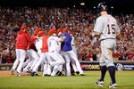 ARLINGTON, TX - OCTOBER 15:  Brandon Inge #15 of the Detroit Tigers walks off the field as the Texas Rangers celebrate winning Game Six of the American League Championship Series 15-5 against the Tigers to advance to the World Series at Rangers Ballpark in Arlington on October 15, 2011 in Arlington, Texas.  (Photo by Kevork Djansezian/Getty Images)