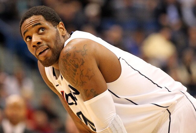 HARTFORD, CT - JANUARY 9:  Alex Oriakhi #34 of the Connecticut Huskies takes a look at the clock in the final minutes of a win against the West Virginia Mountaineers in the second  half at the XL Center on January 9, 2012,  in Hartford, Connecticut.  (Photo by Jim Rogash/Getty Images)