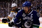 VANCOUVER, BC - JUNE 10:  Henrik Sedin #33 of the Vancouver Canucks skates against Zdeno Chara #33 of the Boston Bruins during Game Five of the 2011 NHL Stanley Cup Final at Rogers Arena on June 10, 2011 in Vancouver, British Columbia, Canada.  (Photo by Bruce Bennett/Getty Images)
