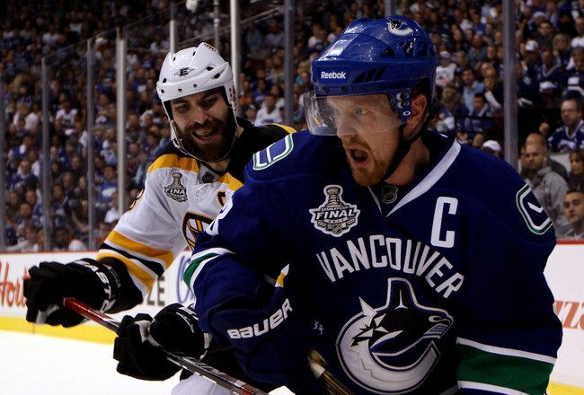 VANCOUVER, BC - JUNE 10:  Henrik Sedin #33 of the Vancouver Canucks skates against Zdeno Chara #33 of the Boston Bruins during Game Five of the 2011 NHL Stanley Cup Final at Rogers Arena on June 10, 2011 in Vancouver, British Columbia, Canada.  (Photo by Bruce Bennett/Getty Images)