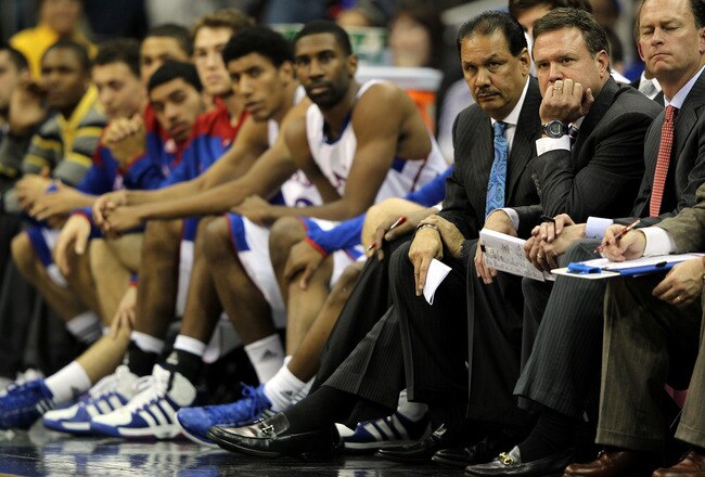 KANSAS CITY, MO - DECEMBER 19:  Head coach Bill Self of the Kansas Jayhawks watches from the bench during the game against the Davidson Wildcats on December 19, 2011 at the Sprint Center in Kansas City, Missouri.  (Photo by Jamie Squire/Getty Images)