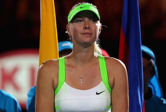 MELBOURNE, AUSTRALIA - JANUARY 28:  Maria Sharapova of Russia looks on after losing her women's final match against Victoria Azarenka of Belarus during day thirteen of the 2012 Australian Open at Melbourne Park on January 28, 2012 in Melbourne, Australia.  (Photo by Cameron Spencer/Getty Images)