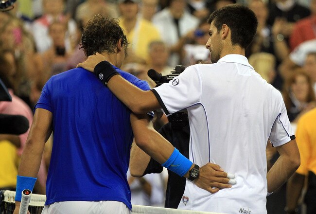 NEW YORK, NY - SEPTEMBER 12:   Rafael Nadal of Spain congratulates  Novak Djokovic of Serbia after Djokovic won the Men's Final on Day Fifteen of the 2011 US Open at the USTA Billie Jean King National Tennis Center on September 12, 2011 in the Flushing neighborhood of the Queens borough of New York City.  (Photo by Matthew Stockman/Getty Images)