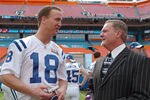 Peyton Manning of the Indianapolis Colts, left, talks with team owner Jim Irsay during Media Day prior to Super Bowl XLI at Dolphins Stadium in Miami, Florida on January 30, 2007. (Photo by A. Messerschmidt/Getty Images)