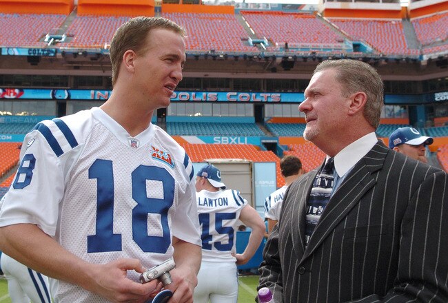 Peyton Manning of the Indianapolis Colts, left, talks with team owner Jim Irsay during Media Day prior to Super Bowl XLI at Dolphins Stadium in Miami, Florida on January 30, 2007. (Photo by A. Messerschmidt/Getty Images)