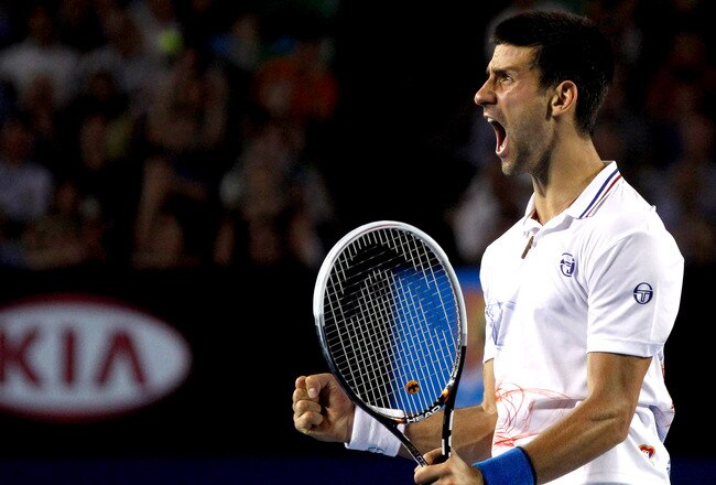 MELBOURNE, AUSTRALIA - JANUARY 27:  Novak Djokovic of Serbia celebrates winning match point in his semifinal match against Andy Murray of Great Britain during day twelve of the 2012 Australian Open at Melbourne Park on January 27, 2012 in Melbourne, Australia.  (Photo by Aaron Favila-Pool/Getty Images)