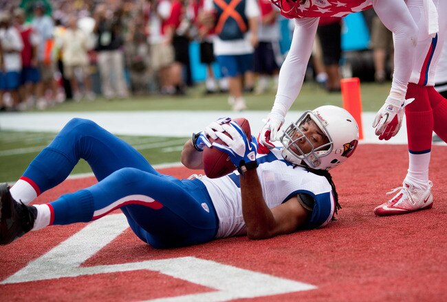 HONOLULU - JANUARY 30: Larry Fitzgerald #11 of the Arizona Cardinals after scoring a touchdown against the American Football Conference (AFC) during the 2011 NFL Pro Bowl at Aloha Stadium on January 30, 2011 in Honolulu, Hawaii.  (Photo by Kent Nishimura/Getty Images)