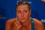 MELBOURNE, AUSTRALIA - JANUARY 28:  Maria Sharapova of Russia speaks in a press conference after losing her women's final match against Victoria Azarenka of Belarus during day thirteen of the 2012 Australian Open at Melbourne Park on January 28, 2012 in Melbourne, Australia.  (Photo by Ryan Pierse/Getty Images)