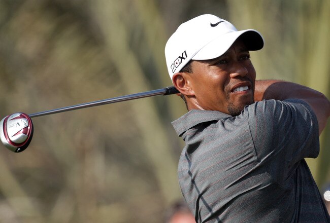 ABU DHABI, UNITED ARAB EMIRATES - JANUARY 28:  Tiger Woods of the USA in action during the third round of Abu Dhabi HSBC Golf Championship at the Abu Dhabi HSBC Golf Championship on January 28, 2012 in Abu Dhabi, United Arab Emirates.  (Photo by Ross Kinnaird/Getty Images)
