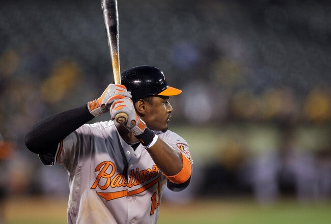 OAKLAND, CA - AUGUST 16:  Adam Jones #10 of the Baltimore Orioles bats against the Oakland Athletics at O.co Coliseum on August 16, 2011 in Oakland, California.  (Photo by Ezra Shaw/Getty Images)