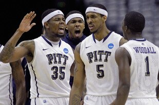 WASHINGTON - MARCH 19:  Nasir Robinson #35 of the Pittsburgh Panthers celebrates with teammates Gilbert Brown#5 and Travon Woodall #1 during the third round of the 2011 NCAA men's basketball tournament at Verizon Center on March 19, 2011 in Washington, DC.  (Photo by Rob Carr/Getty Images)
