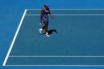 MELBOURNE, AUSTRALIA - JANUARY 23:  Serena Williams of the United States of America reacts after a shot in her fourth round match against Ekaterina Makarova of Russia during day eight of the 2012 Australian Open at Melbourne Park on January 23, 2012 in Melbourne, Australia.  (Photo by Robert Prezioso/Getty Images)
