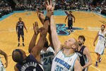 NEW ORLEANS, LA - JANUARY 18:  Chris Kaman #35 of the New Orleans Hornets fights for a rebound with Dante Cunningham #44 of the Memphis Grizzlies at New Orleans Arena on January 18, 2012 in New Orleans, Louisiana.  NOTE TO USER: User expressly acknowledges and agrees that, by downloading and or using this photograph, User is consenting to the terms and conditions of the Getty Images License Agreement.  (Photo by Chris Graythen/Getty Images)