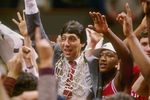 4 Apr 1983: Head coach Jim Valvano of the North Carolina State Wolfpack celebrates with his team after the Wolfpack defeated the Houston Cougars 54-52 in the NCAA men''s basketball championship game at University Arena in Albuquerque, New Mexico.