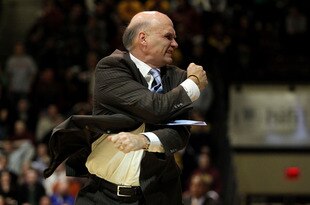 PHILADELPHIA, PA - DECEMBER 08:  Head coach Phil Martelli of the St. Joseph's Hawks reacts as he coaches in the second half against the Minnesota Golden Gophers at Michael J. Hagan Arena on December 8, 2010 in Philadelphia, Pennsylvania.  (Photo by Chris Chambers/Getty Images)