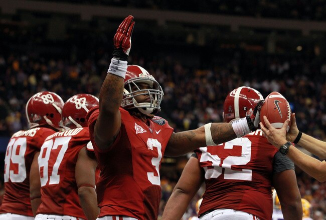 NEW ORLEANS, LA - JANUARY 09:  Trent Richardson #3 of the Alabama Crimson Tide celebrates after scoring a touchdown in the fourth quarter against the Louisiana State University Tigers during the 2012 Allstate BCS National Championship Game at Mercedes-Benz Superdome on January 9, 2012 in New Orleans, Louisiana.  (Photo by Ronald Martinez/Getty Images)