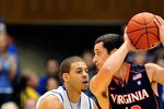 DURHAM, NC - JANUARY 12:  Seth Curry #30 of the Duke Blue Devils defends Sammy Zeglinsky #13 of the Virginia Cavaliers during play at Cameron Indoor Stadium on January 12, 2012 in Durham, North Carolina.  (Photo by Grant Halverson/Getty Images)