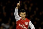 LONDON, ENGLAND - JANUARY 02:  Laurent Koscielny of Arsenal celebrates after scoring the opening goal during the Barclays Premier League match between Fulham and Arsenal at Craven Cottage on January 2, 2012 in London, England.  (Photo by Clive Rose/Getty Images)