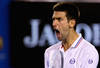 MELBOURNE, AUSTRALIA - JANUARY 29:  Novak Djokovic of Serbia reacts after a point in his men's final match against Rafael Nadal of Spain during day fourteen of the 2012 Australian Open at Melbourne Park on January 29, 2012 in Melbourne, Australia.  (Photo by Mark Kolbe/Getty Images)