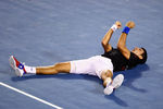MELBOURNE, AUSTRALIA - JANUARY 29:  Novak Djokovic of Serbia celebrates winning championship point in his men's final match against Rafael Nadal of Spain during day fourteen of the 2012 Australian Open at Melbourne Park on January 29, 2012 in Melbourne, Australia.  (Photo by Clive Brunskill/Getty Images)
