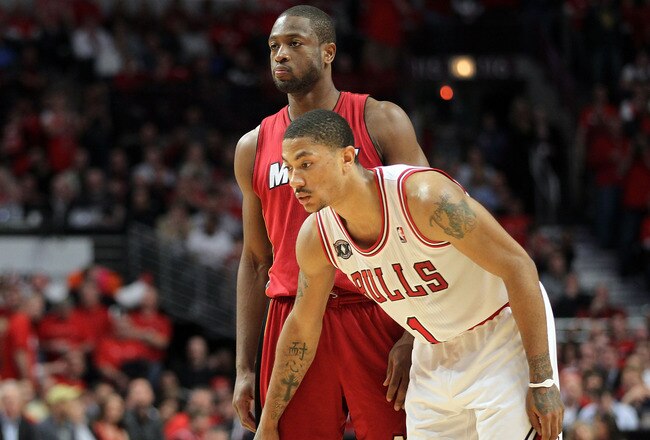 CHICAGO, IL - MAY 26:  Derrick Rose #1 of the Chicago Bulls lines up against Dwyane Wade #3 of the Miami Heat in Game Five of the Eastern Conference Finals during the 2011 NBA Playoffs on May 26, 2011 at the United Center in Chicago, Illinois. NOTE TO USER: User expressly acknowledges and agrees that, by downloading and or using this photograph, User is consenting to the terms and conditions of the Getty Images License Agreement.  (Photo by Mike Ehrmann/Getty Images)