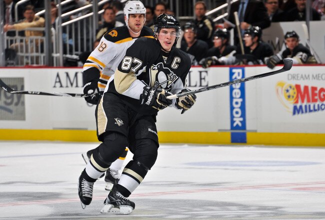 PITTSBURGH, PA - DECEMBER 5:  Sidney Crosby #87 of the Pittsburgh Penguins skates against the Boston Bruins on December 5, 2011 at CONSOL Energy Center in Pittsburgh, Pennsylvania.  (Photo by Jamie Sabau/Getty Images)
