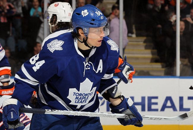 UNIONDALE, NY - JANUARY 24:  Mikhail Grabovski #84 of the Toronto Maple Leafs in action against the New York Islanders on January 24, 2012 at Nassau Coliseum in Uniondale, New York. The Maple Leafs defeated the Islanders 4-3 after overtime.  (Photo by Jim McIsaac/Getty Images)