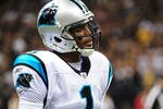 NEW ORLEANS, LA - JANUARY 1: Cam Newton #1 of the Carolina Panthers heads off the field after throwing an interception against the New Orleans Saints at the Mercedes-Benz Superdome on January 1, 2012 in New Orleans, Louisiana  (Photo by Scott Cunningham/Getty Images)
