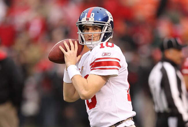 SAN FRANCISCO, CA - JANUARY 22:  Eli Manning #10 of the New York Giants warms up against the San Francisco 49ers during the NFC Championship Game at Candlestick Park on January 22, 2012 in San Francisco, California.  (Photo by Ezra Shaw/Getty Images)